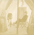 Unidentified soldier sitting inside his tent in Cuba (1961.15.5.1) by Kentucky Library Research Collection