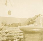 Unidentified soldier reclined on a ship's ropes (1961.16.5.8)